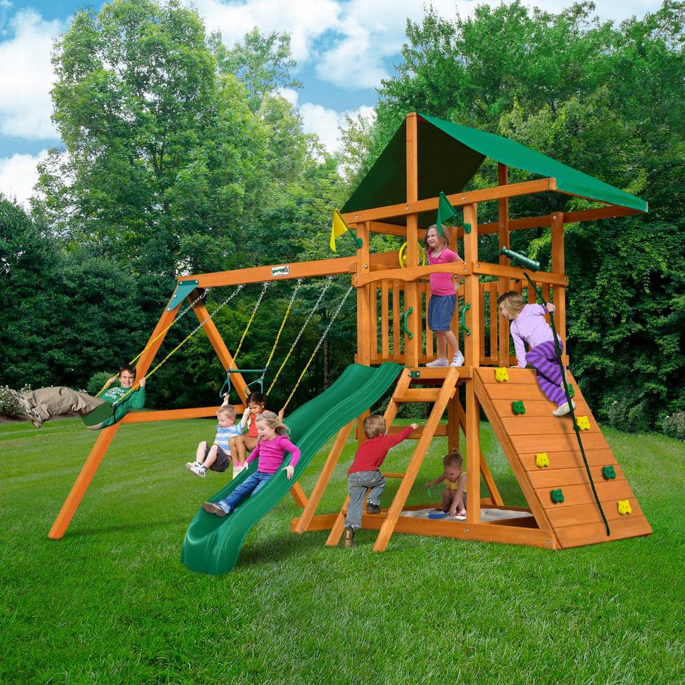 DYI Outing III Wooden Outdoor Playset with Tarp Roof, Rock Wall, Wave Slide, Swings, and Backyard Swing Set Accessories